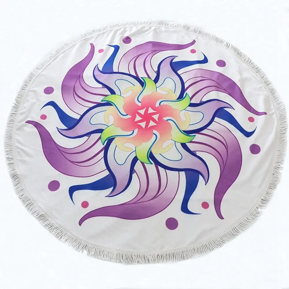 White round beach towel with a purple and blue swirling pattern, a multicolored center and white fringe.