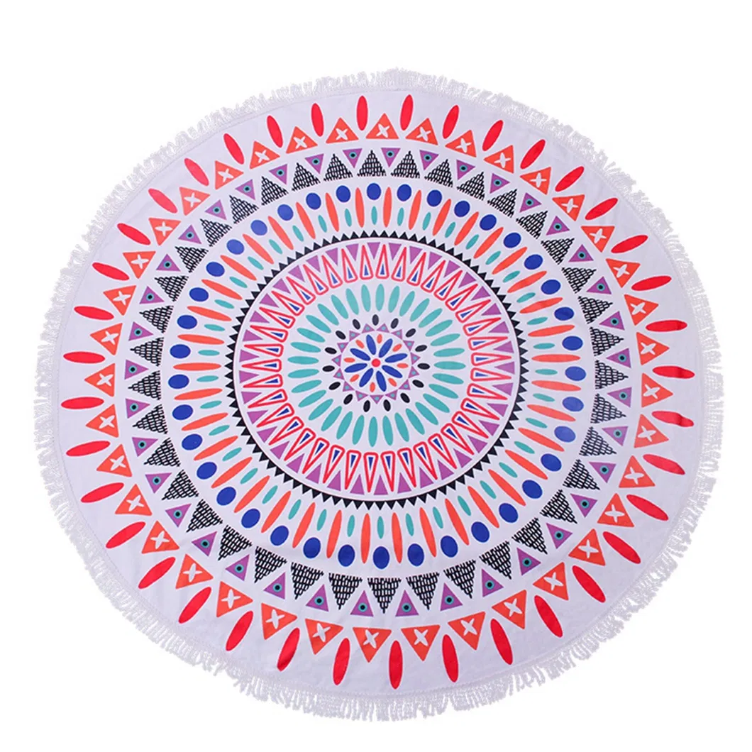 Round beach towel with a colorful concentric geometric pattern and white fringe on a white background.